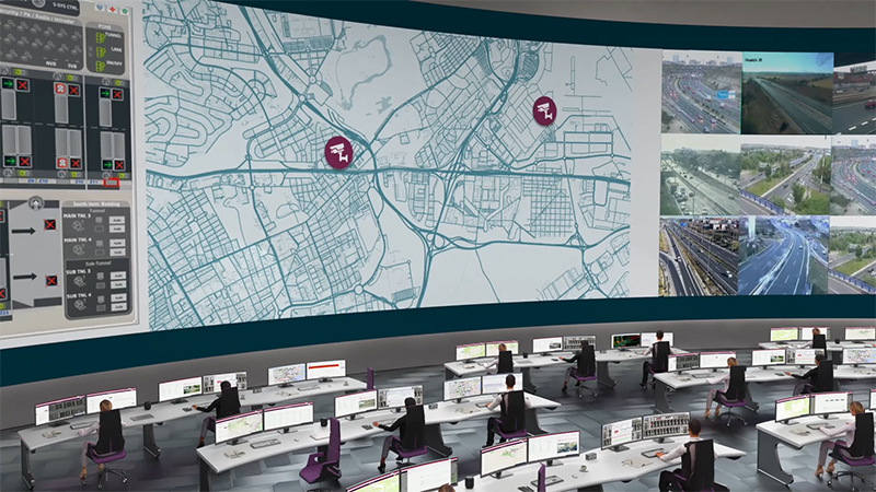 A rendered 3D image of a control center with people working and a screen the size of the far wall showing road live video feeds and map data.